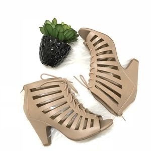 Beige laser cut caged lace up heels
